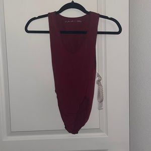 Out from under bodysuit. S.